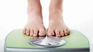 feet on scales for weight loss
